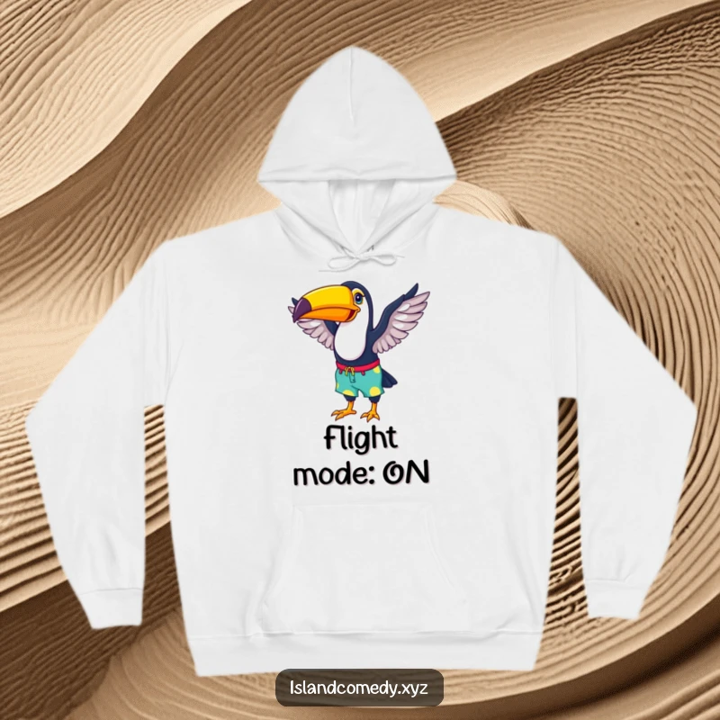 Funny hoodie depicting a happy toucan in colorful beach shorts flapping its wings, offering cozy tropical vibes.